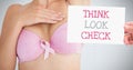 Think Look Check Text and Hand holding card with pink breast cancer awareness woman Royalty Free Stock Photo