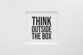 Think outside the box message in a textbox on white background. 3D illustration