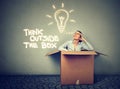 Think outside box. Woman coming out of box with great idea Royalty Free Stock Photo