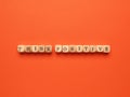 Think positive written with small wooden blocks Royalty Free Stock Photo
