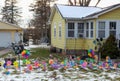 Think Spring - Yellow House with Floral Whirligigs