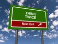 think twice next exit traffic sign on blue sky Royalty Free Stock Photo