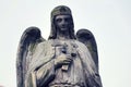 Thinking angel with cross statue, Malostransky cemetery, Prague, Czech Republic