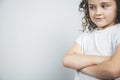 Thinking baby girl curly hair Royalty Free Stock Photo