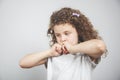 Thinking baby girl curly hair Royalty Free Stock Photo