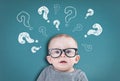 Thinking baby with questions Royalty Free Stock Photo