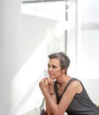 Thinking big. a mature businesswoman looking thoughtful while sitting in her office. Royalty Free Stock Photo