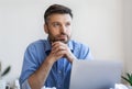 Thinking About Business Plan. Pensive Businessman Working On New Project In Office Royalty Free Stock Photo