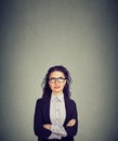 Thinking business woman in glasses looking up Royalty Free Stock Photo