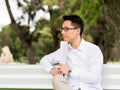 Thinking businessman during his break in park Royalty Free Stock Photo