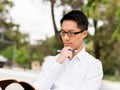Thinking businessman during his break in park Royalty Free Stock Photo