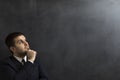 Businessman looking question marks on the blackboard Royalty Free Stock Photo