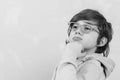 Thinking child. Cute boy wearing glasses. Boy has new idea Royalty Free Stock Photo