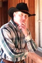 Thinking Cowboy in Black Cowboy Hat Royalty Free Stock Photo