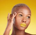 Thinking, creative makeup and black woman with skincare, cosmetics and dermatology on a yellow studio background. Female