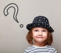 Thinking cute kid with big question sign above