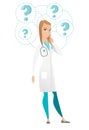 Thinking doctor with question marks. Royalty Free Stock Photo