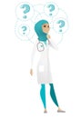 Thinking doctor with question marks. Royalty Free Stock Photo