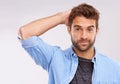 Thinking, doubt or portrait of man in studio with confused, gesture or reaction on white background. Why, hmm and face Royalty Free Stock Photo