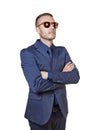 Thinking elegant businessman with sunglasses