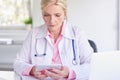 Female doctor using toucpad at the private clinic Royalty Free Stock Photo