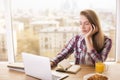 Thinking girl using laptop Royalty Free Stock Photo