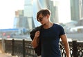 Thinking handsome young man posing in fashion sun glasses and ho Royalty Free Stock Photo