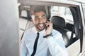 Thinking, happy and businessman on phone call in a car for travel communication and work. Smile, ideas and a young Royalty Free Stock Photo