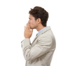 Thinking of his next corporate move. Studio shot of a handsome young businessman thinking isolated on white. Royalty Free Stock Photo