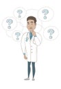 Thinking hispanic doctor with question marks. Royalty Free Stock Photo