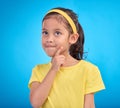 Thinking, idea and face of child in studio with contemplation, thoughtful and planning expression. Ideas mockup