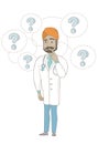 Thinking indian doctor with question marks. Royalty Free Stock Photo