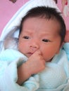 Thinking infant Royalty Free Stock Photo