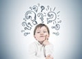 Thinking little boy, finger cheek question marks Royalty Free Stock Photo