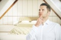 Thinking man in bedroom Royalty Free Stock Photo