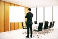 Thinking man looking at whiteboard Royalty Free Stock Photo