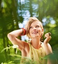 Thinking, outdoor and nature with woman, sunshine and freedom with inspiration, countryside and summer. Person, outside