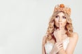 Thinking. Portrait closeup of happy crowned Beauty queen girl woman actress miss deciding looking away up  white wall Royalty Free Stock Photo