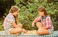 thinking process. early childhood development. worthy opponents. develop hidden abilities. two girls play chess. chess Royalty Free Stock Photo