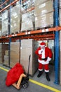 Thinking santa claus in storehouse