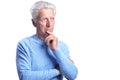 Thinking senior man isolated on white background Royalty Free Stock Photo