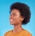 Thinking, smile and happy black woman wondering looking away in thought isolated against a blue studio background. Afro Royalty Free Stock Photo