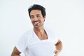 Thinking, smile and a young man dressing in studio isolated on white background at the start of his morning. Idea