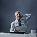 Thinking, tablet and business man in office, working on online project, planning and writing email. Corporate worker Royalty Free Stock Photo