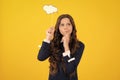 Thinking teenager girl, thoughtful emotion. Teen girl holding clouds empty space, thinking bubble, comment cloud over Royalty Free Stock Photo