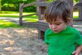 Thinking Toddler in a Playground Royalty Free Stock Photo