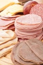 Thinly Sliced Meats on White Background