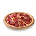 Thinly sliced pepperoni is a popular pizza topping in American-style pizzerias Royalty Free Stock Photo