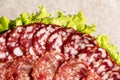 Thinly sliced salami slices close-up. Royalty Free Stock Photo