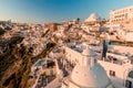 Thira, Greece - 11.07.2021: Santorini white architecture village top view. Royalty Free Stock Photo